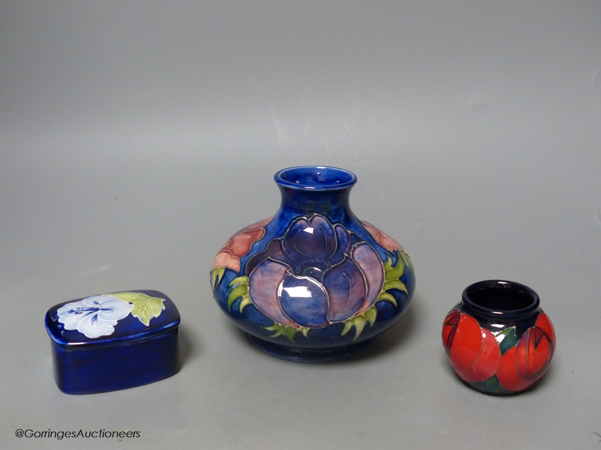 Two Moorcroft pottery vases and a lidded box (3)